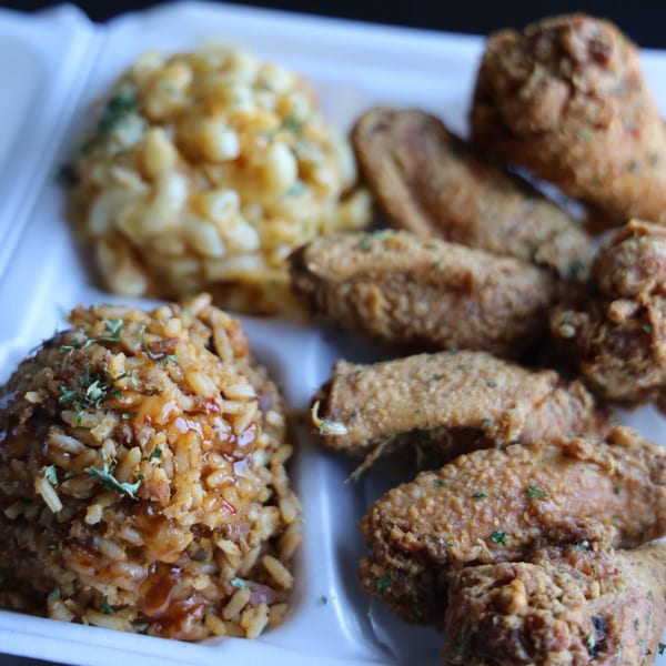 A Jive Turkey soul food meal with fried chicken, mac and cheese, and rice.